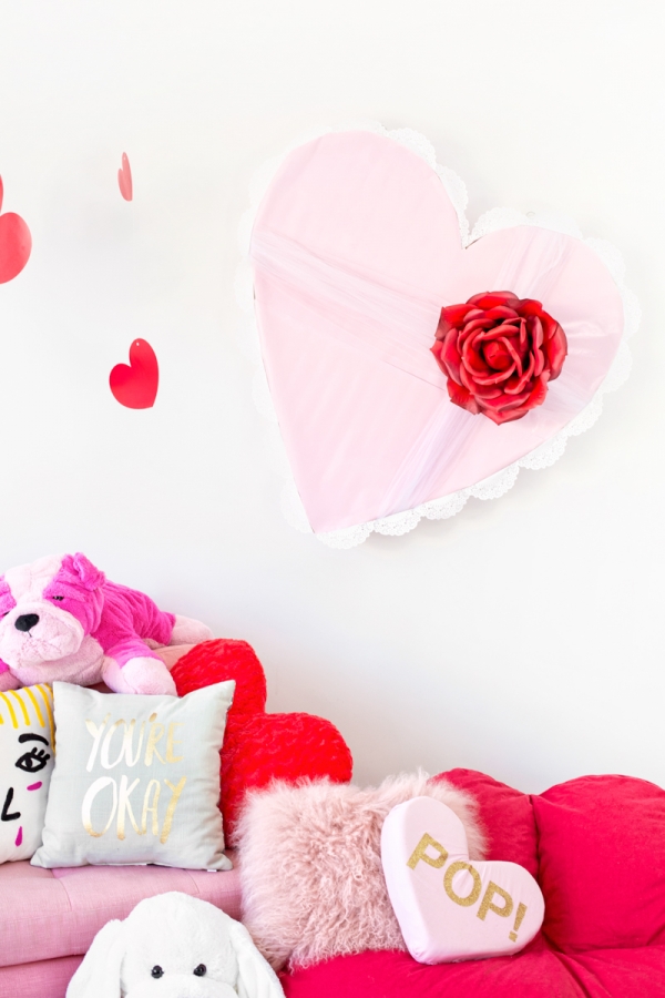A giant pink heart with a rose in the middle
