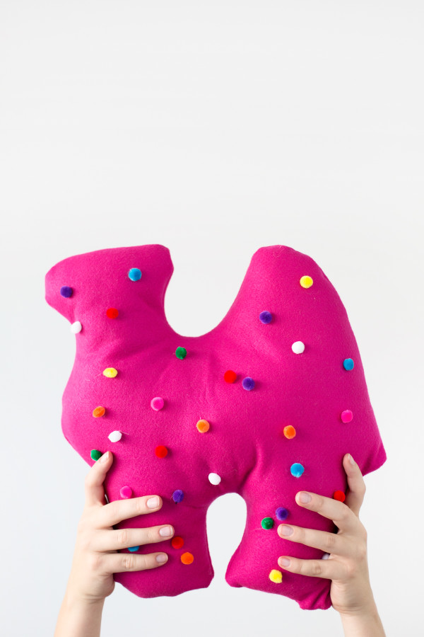 Pink circus animal cookie pillow