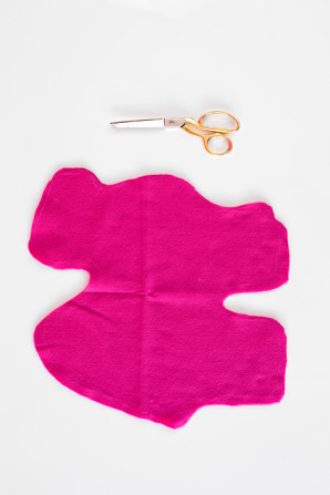 Pink fabric and scissors