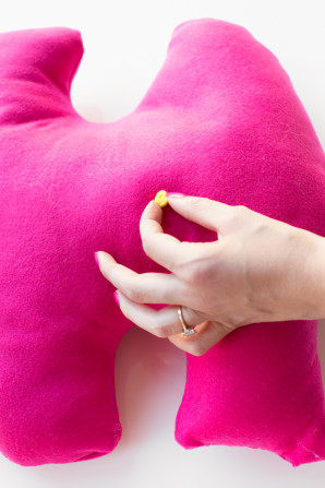 Pink fabric and cotton balls