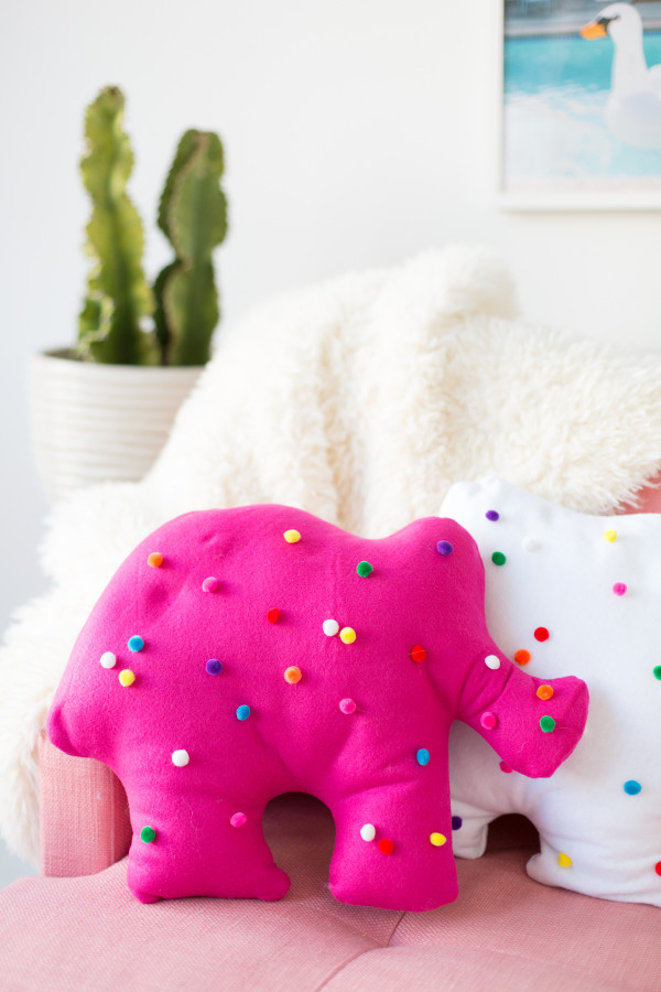 Pink circus animal cookie pillow