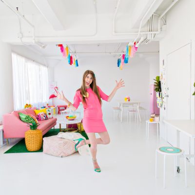 The Evolution of Studio DIY A woman wearing a pink dress