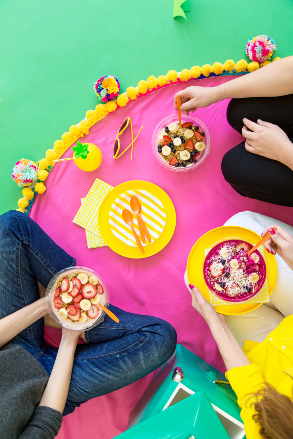 People eating acai bowls