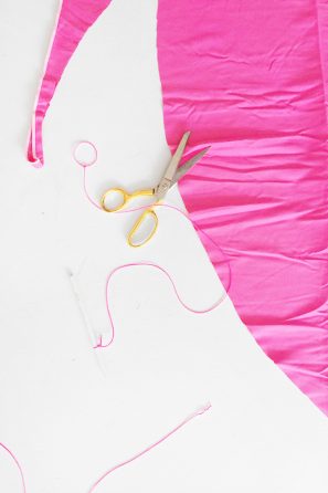 Pink fabric and scissors 