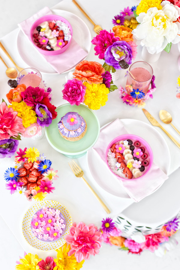 A table setting with flowers
