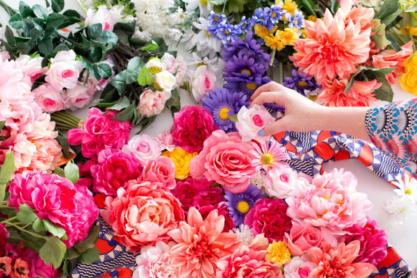 Someone holding a fake flower