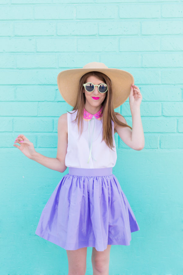 A woman wearing sunglasses and a hat
