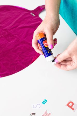 Someone gluing something 