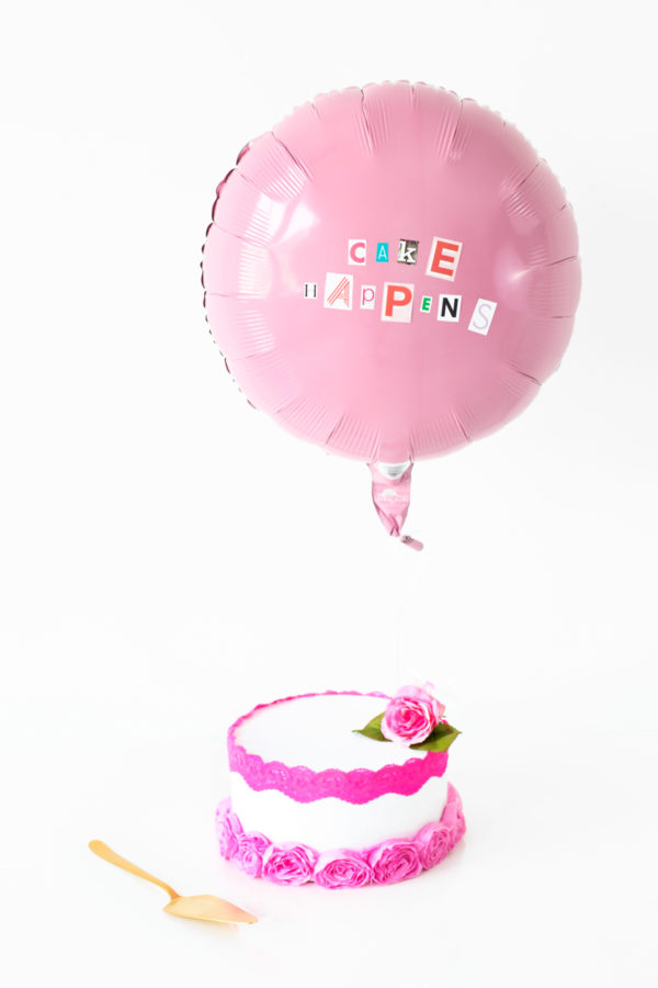 Pink balloon and cake