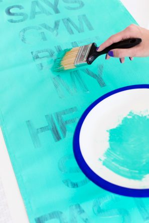 Someone painting something aqua