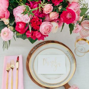 Plate, utensils, and flowers