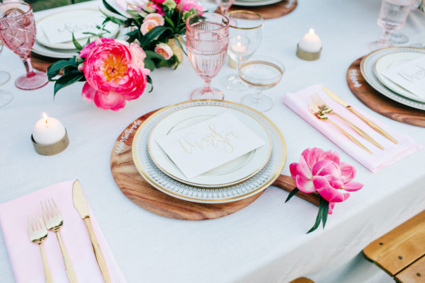 A plate with utensils and flowers