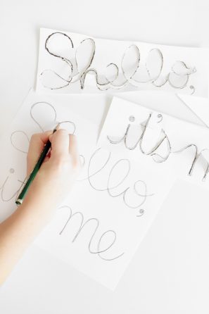 Someone writing something on paper