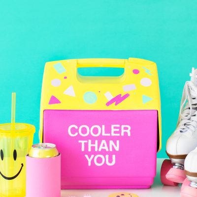 DIY Throwback Cooler Makeover A pink and yellow cooler that says "cooler than you"