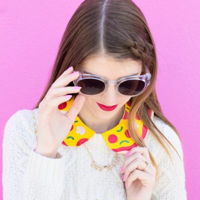 A woman wearing sunglasses posing for the camera