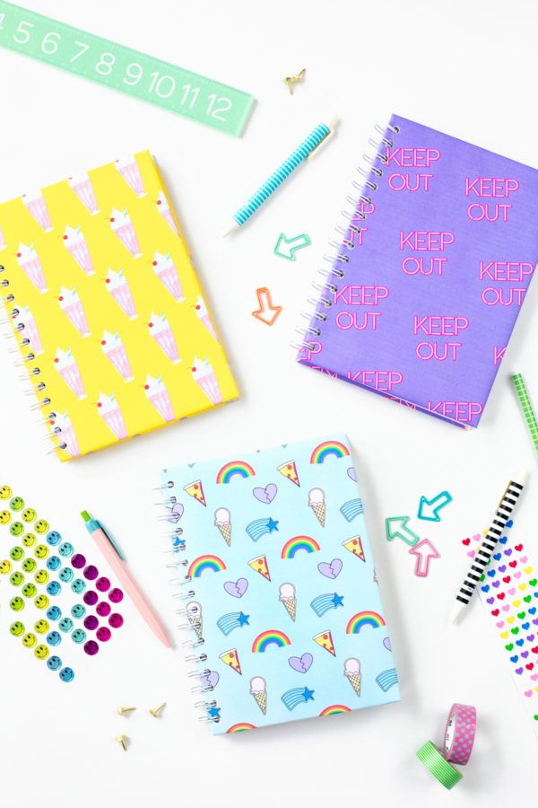 Notebooks with graphics on them