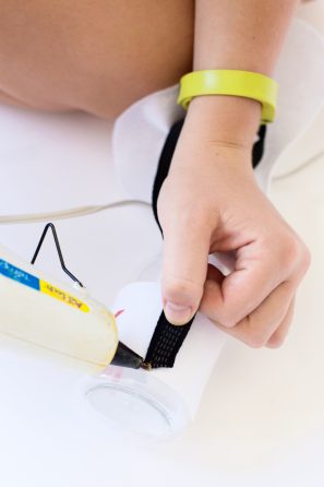 Someone gluing a material