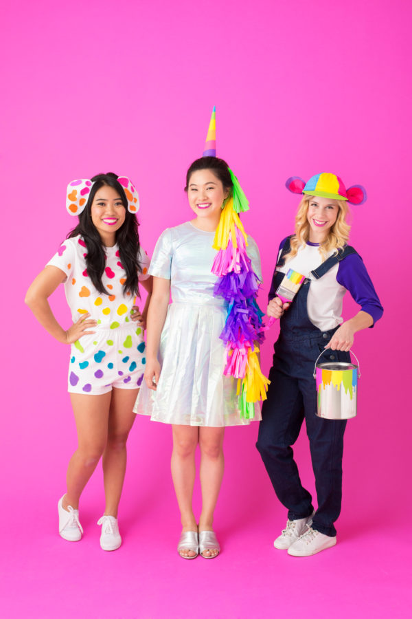 Three people dressed in costumes