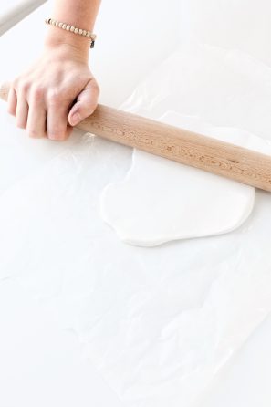 Someone rolling dough 