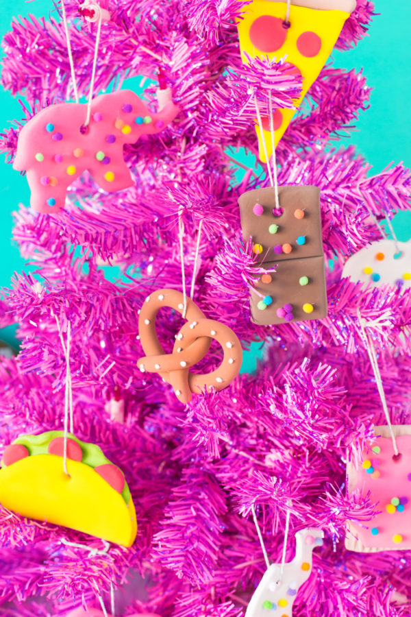 Junk food ornaments on a pink Christmas tree