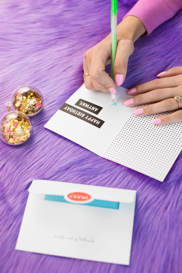 A notebook and confetti earrings