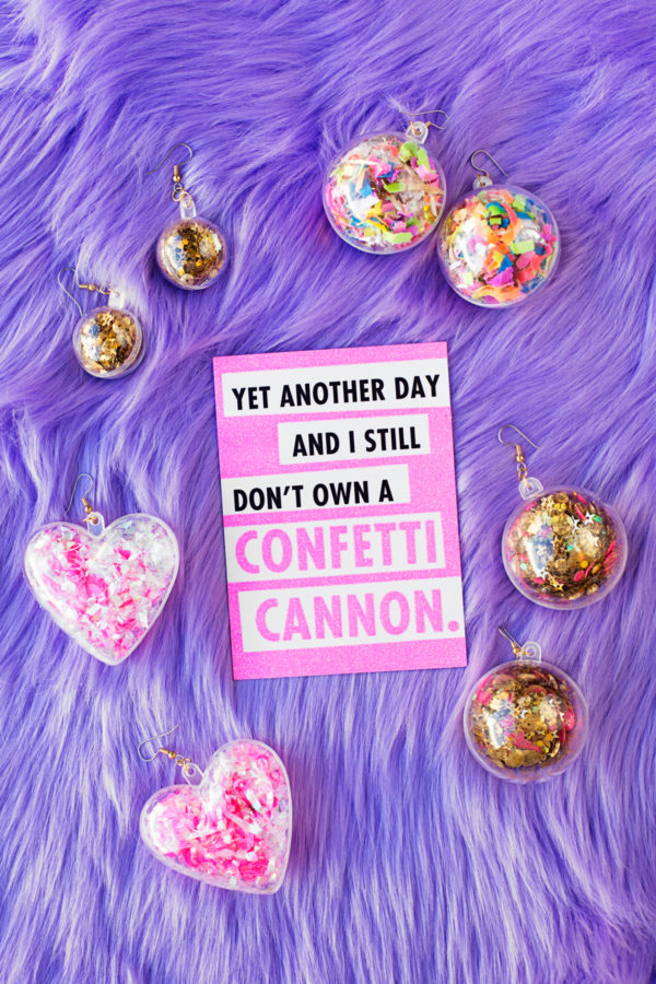 A pink paper and confetti earrings