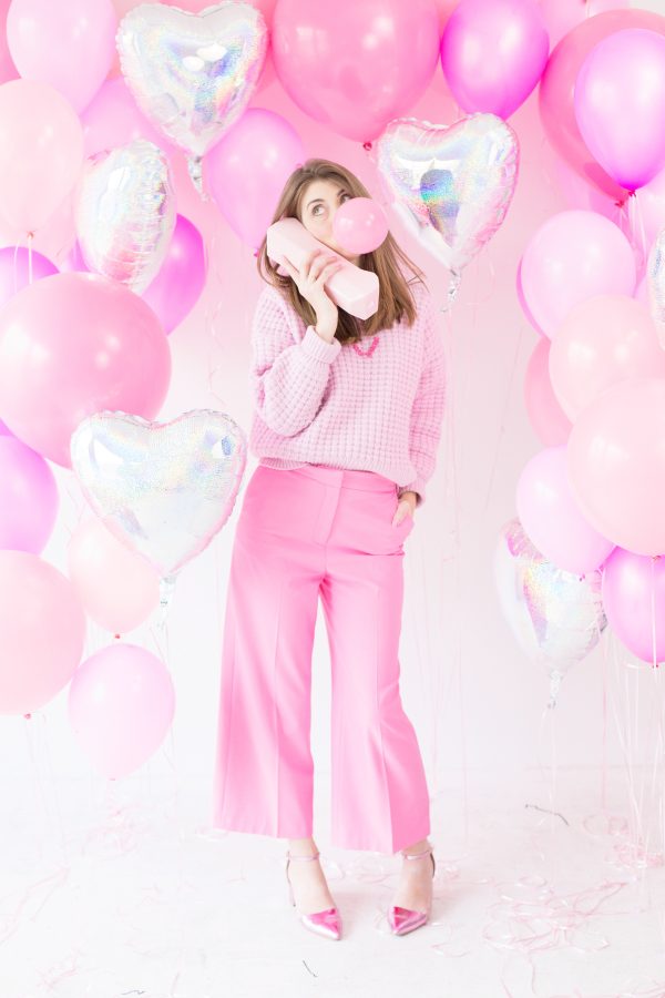 A woman wearing pink clothes