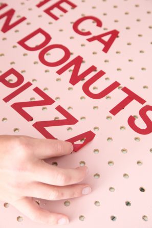 Board with red words on it