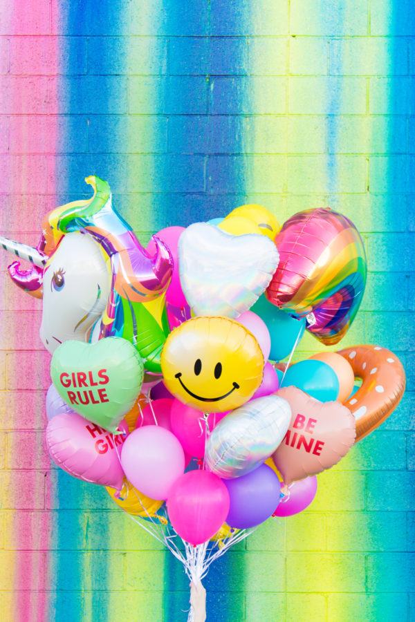 Balloons in front of a colorful ball