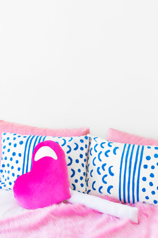 A bed with pillows