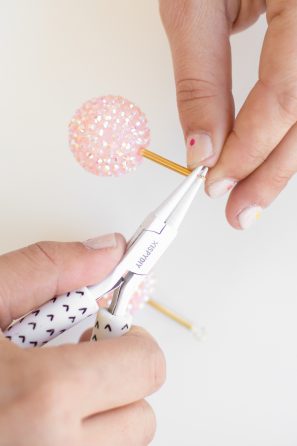 Someone making an earring