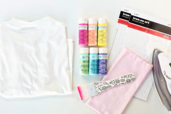 Paint, paintbrush, and white shirt