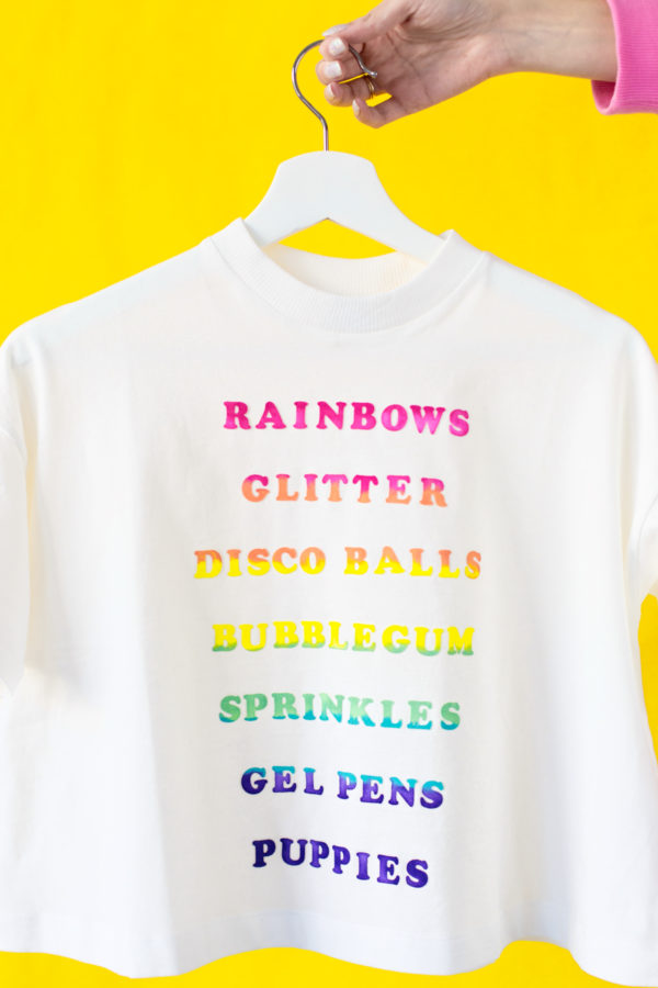 Rainbow words on a white shirt