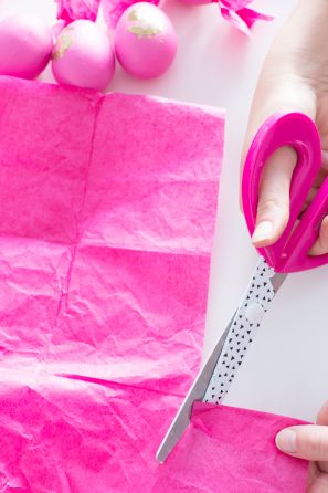Pink paper and pink scissors