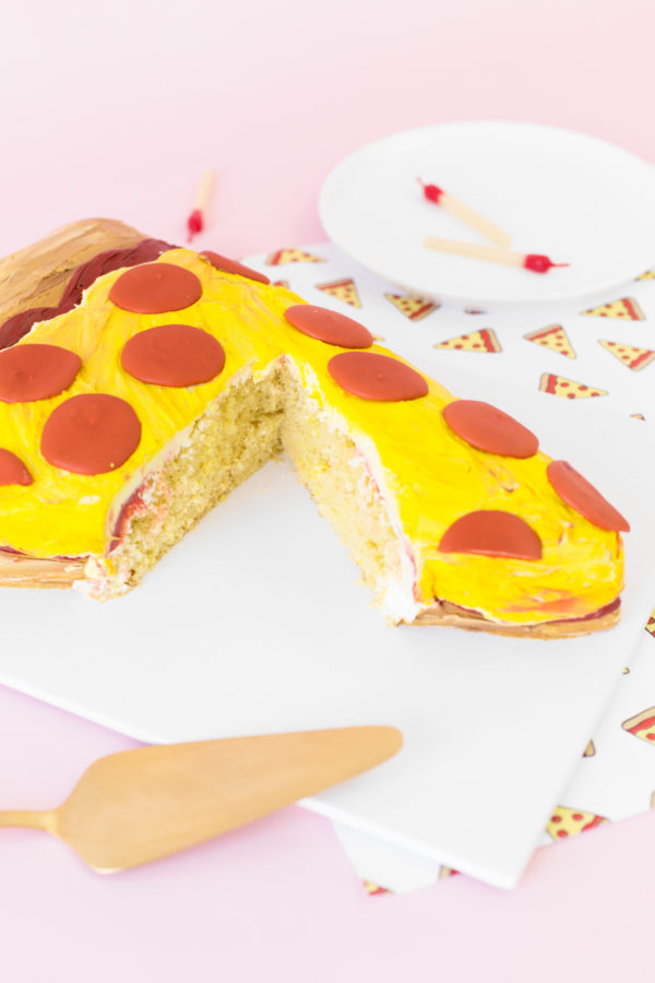 A cake that looks like a slice of pizza
