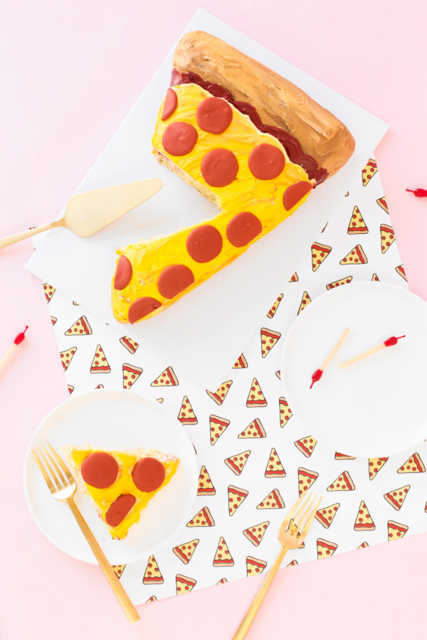 A pizza cake and plates