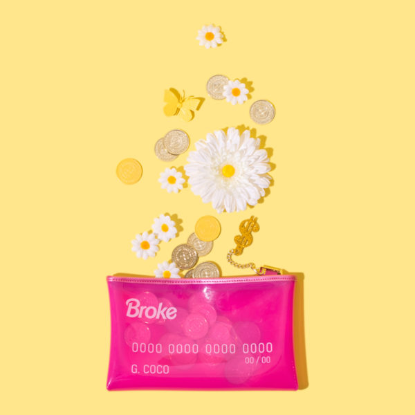 Hot pink clutch on a yellow background