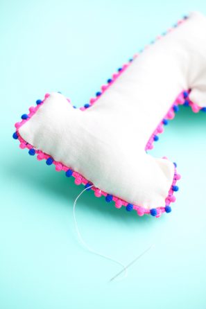 Pillow with colorful stitching 