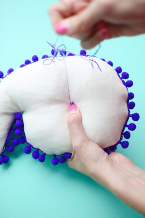 Pillow with colorful stitching 
