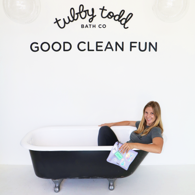 What's In My Clutch: Tubby Todd A woman sitting in a bathtub