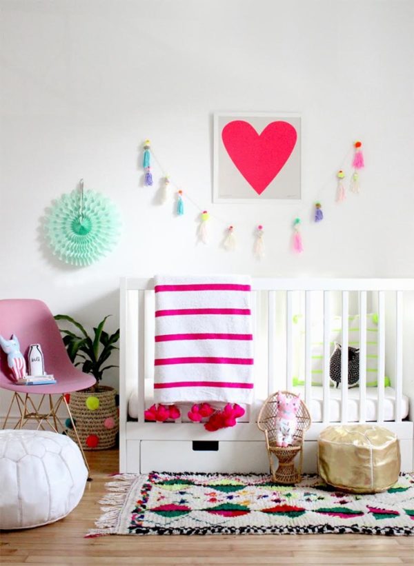 A crib with a blanket