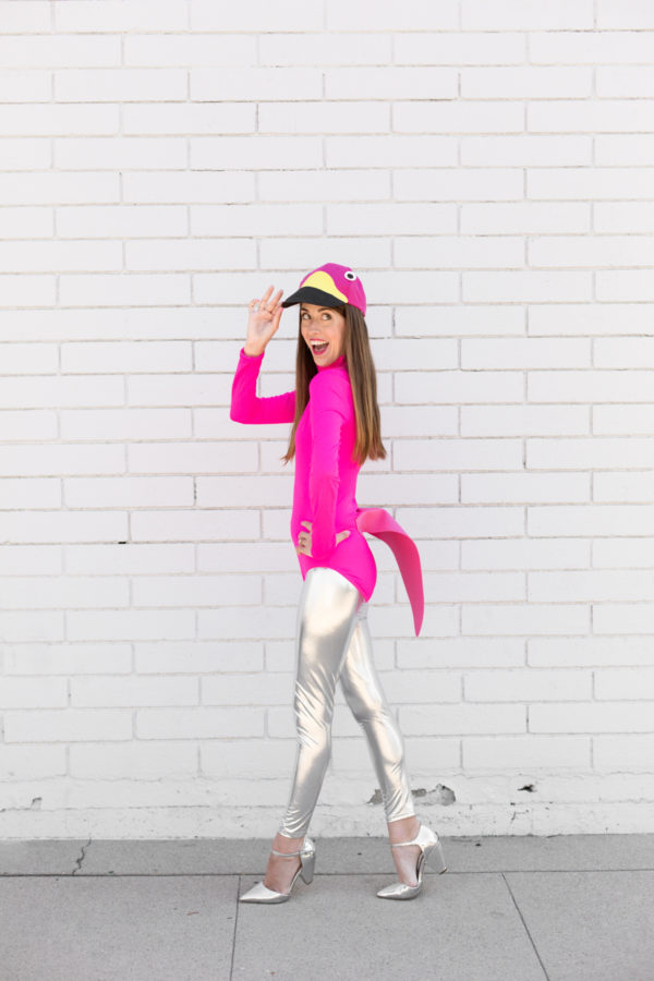 A woman dressed as a flamingo