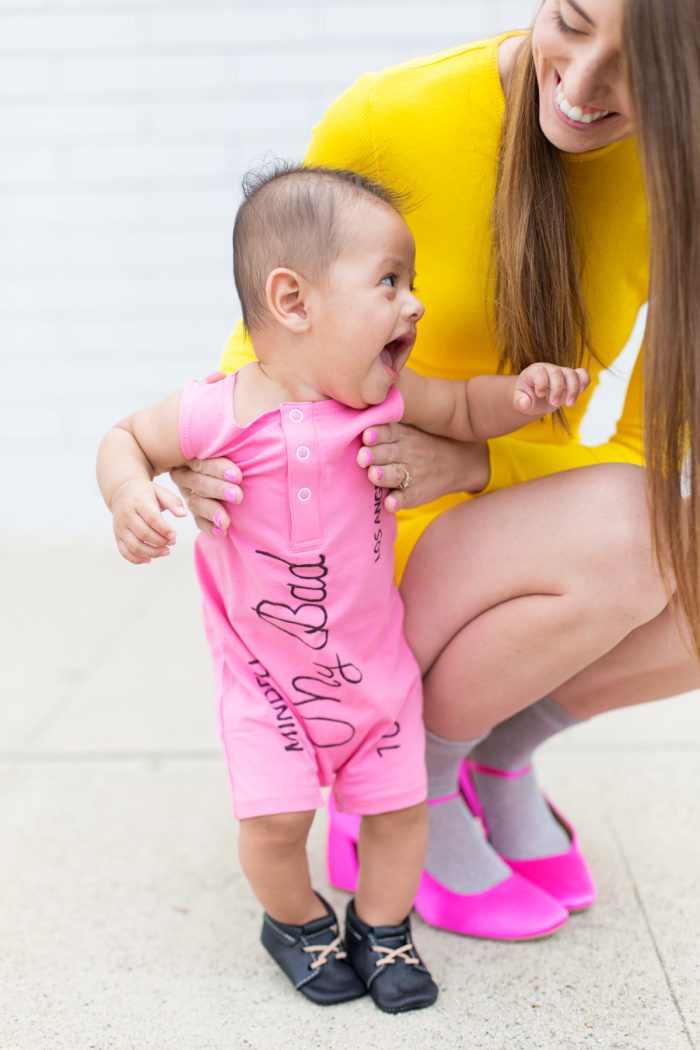 A baby dressed as a eraser