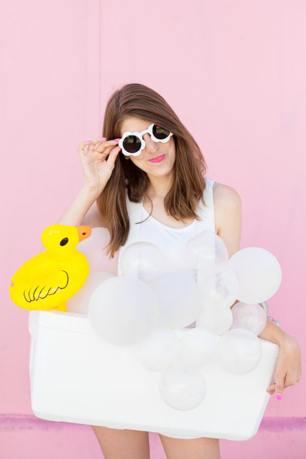 A woman dressed as a bathtub 