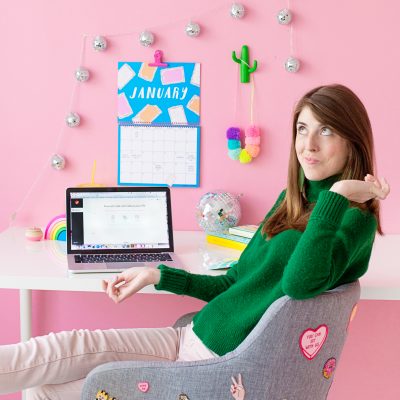 The Entrepreneur's Guide to Tax Season (Part 1) Someone sitting at a desk
