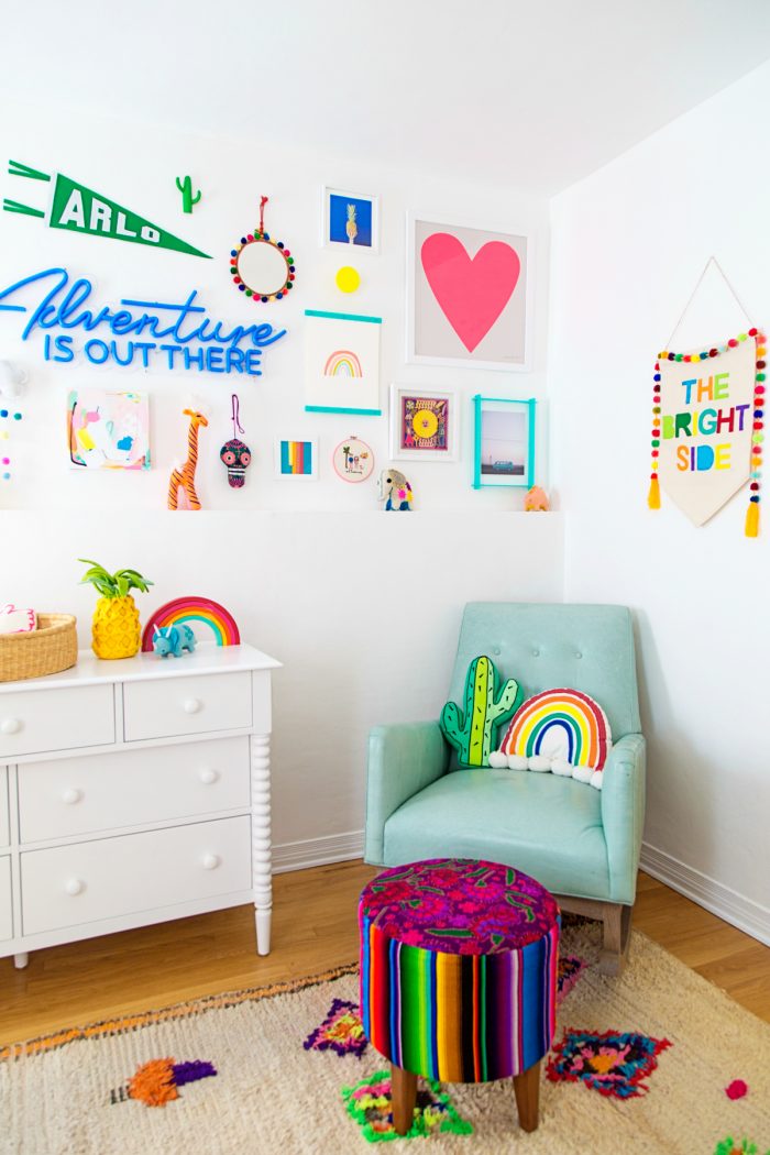 A bedroom with a chair in the corner