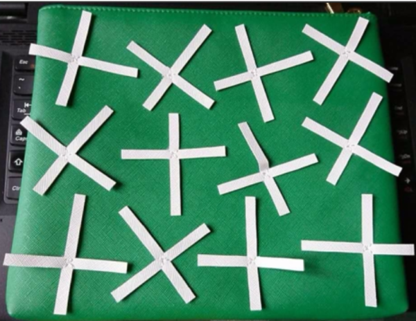 White paper on green background