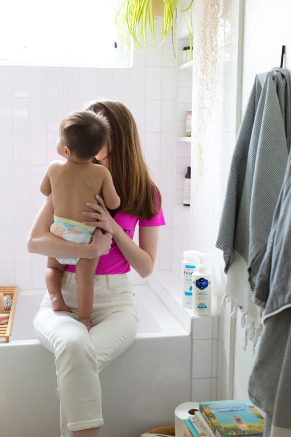 A woman holding a baby