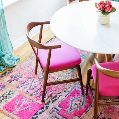 Where To Buy Colorful Vintage Moroccan Rugs (My Fave Sources!) Dining room with pink chairs