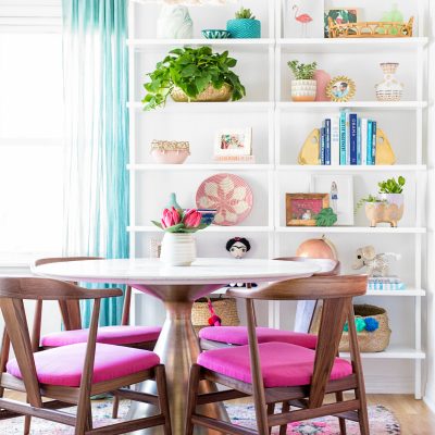 Our Dining Room Reveal! A dining room filled with shelves